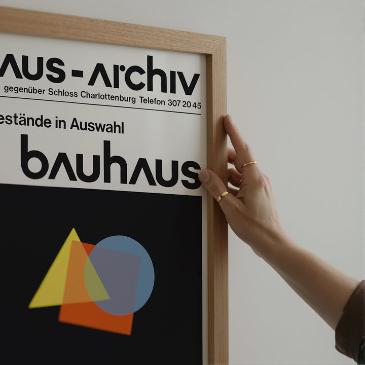 Bauhaus-Archiv Exhibition Poster minimalist art print with geometric shapes in black, orange, yellow, and blue tones.