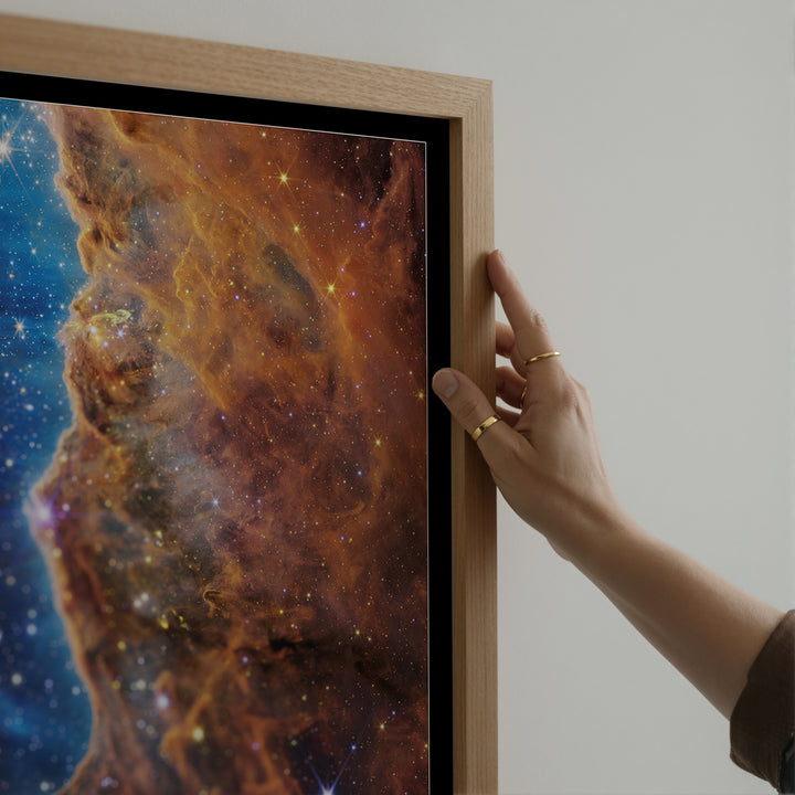 James Webb Telescope Carina Nebula wall art poster displayed in a modern interior setting