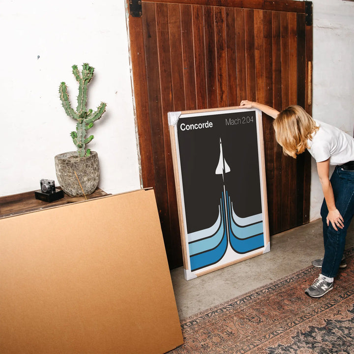 Concorde Mach 2.04 Poster minimalist art print with black background and blue graphic lines, framed poster wall art