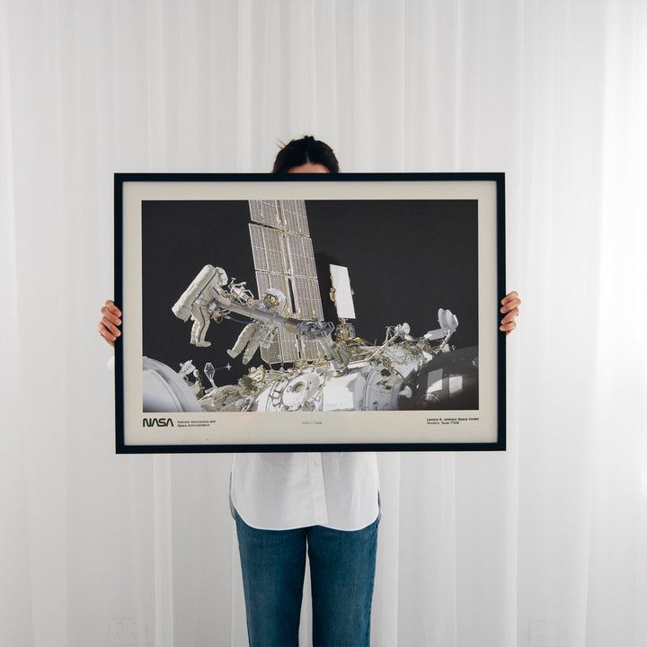 Cosmonauts Conducting a Spacewalk Poster