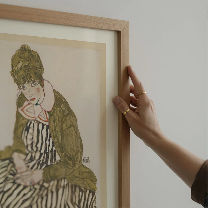 Edith with Striped Dress, Sitting by Egon Schiele Poster Poster Room