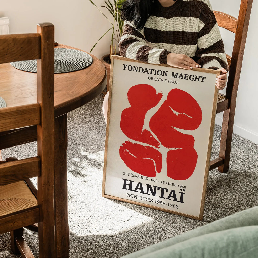 Simon Hantai Exhibition Poster featuring abstract red shapes on a cream background, minimalist framed poster.