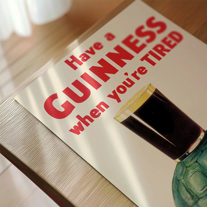 Have a Guinness When You're Tired Poster featuring vintage minimalist design with red text and dark beer glass art print