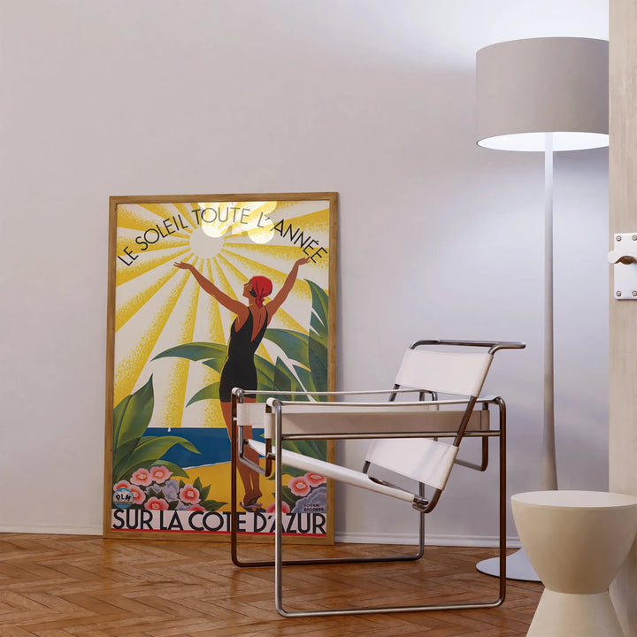 Le Soleil Toute L'Année Poster showing minimalist vintage style woman with red headscarf, sun, and tropical leaves in yellow and green tones.