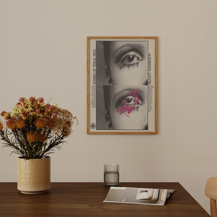 School of Visual Arts Faculty Exhibition Poster with abstract black and white face art and pink brush strokes, framed wall art.
