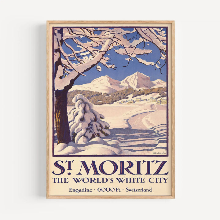 St. Moritz Vintage Poster vintage art print shows snowy mountains and trees in soft blues and creams with bold text at bottom.