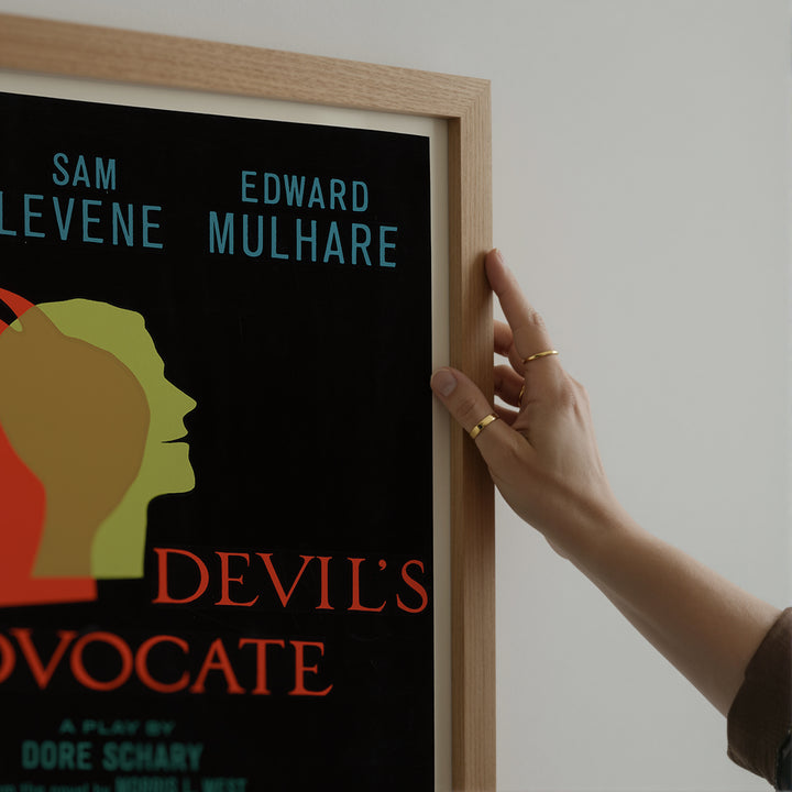 The Devil's Advocate Vintage Playbill Poster with minimalist silhouettes in green and red on black, vintage theatre poster wall art.