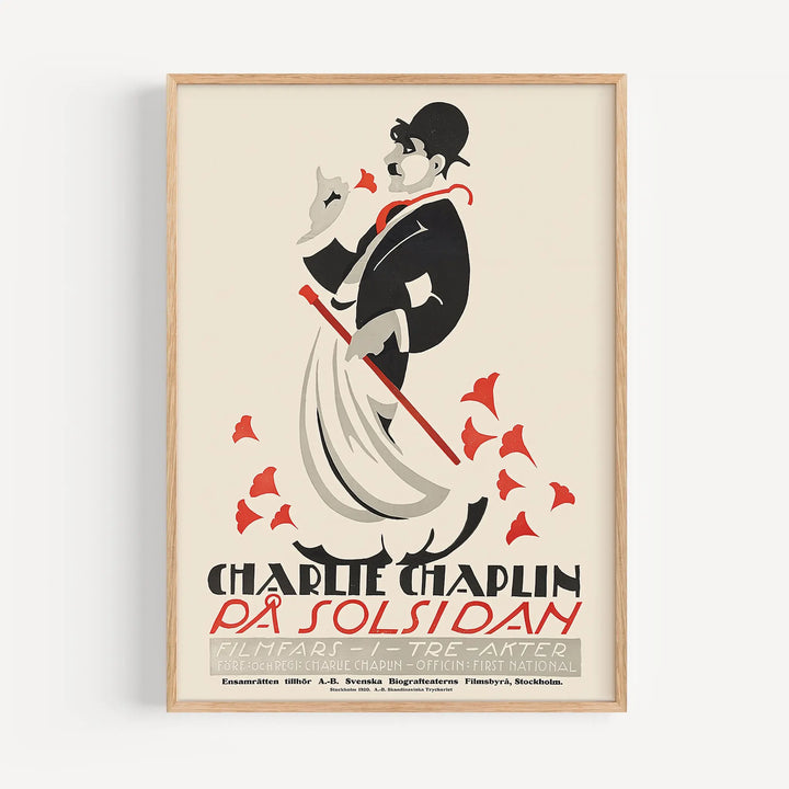 Charlie Chaplin Stockholm Poster with vintage minimalist art showing Chaplin in black, white, and red on a cream background.