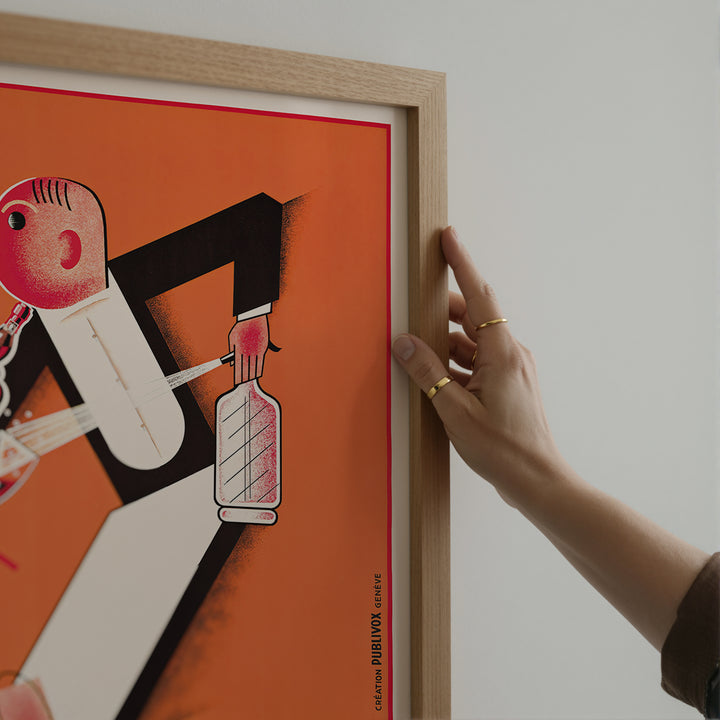 Picon Advertisement Poster featuring vintage minimalist art style in bold orange, black, and white colors, framed wall art.