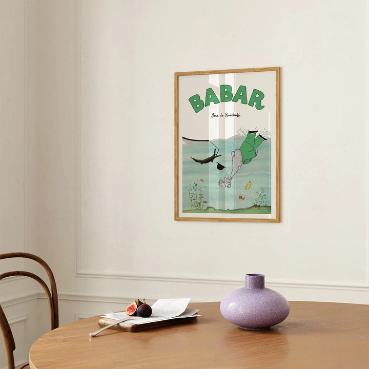 Diving Babar Poster framed artwork showing a vintage style elephant diving into water with muted green and blue tones